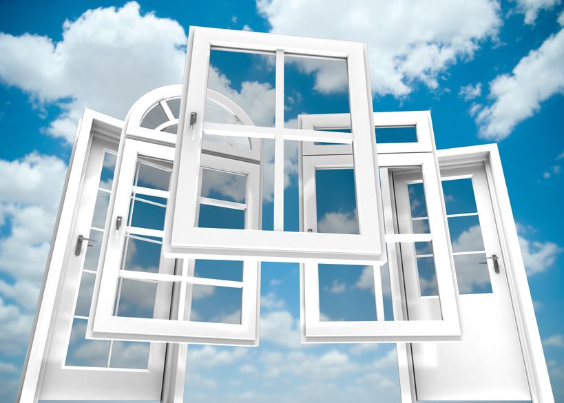 18874215 - selection of doors and windows with a blue sky on the background
